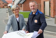 Maggie Abel of Abel Homes and stonecarver Teucer Wilson plan the new artwork at East Harling sm
