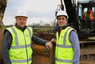 Robert Loudoun left and Paul LeGrice of Abel Homes dig the first sod at the site of 40 new homes in Bawdeswell sm